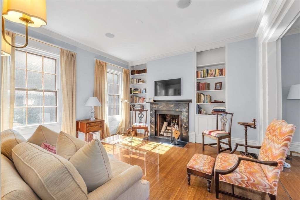52 River Street Boston, MA 02108 - Photo 19 of 37 a living room with furniture and a fireplace