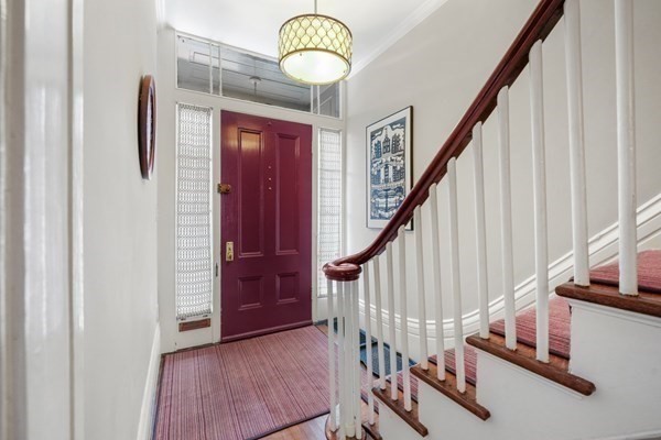 52 River Street Boston, MA 02108 - Photo 2 of 37 a view of entryway with wooden floor