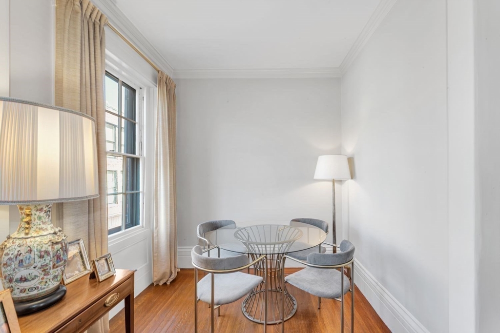 52 River Street Boston, MA 02108 - Photo 25 of 37 a view of a livingroom with furniture and a window