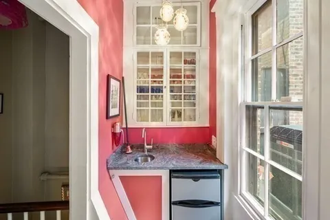 a view of a window and a sink