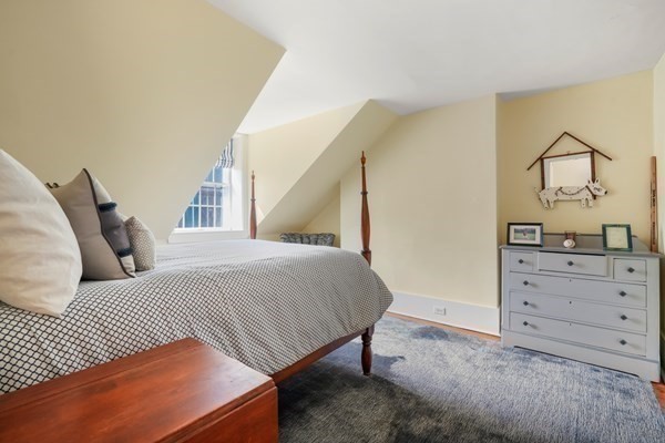 52 River Street Boston, MA 02108 - Photo 36 of 37 a bedroom with a bed and with mirror