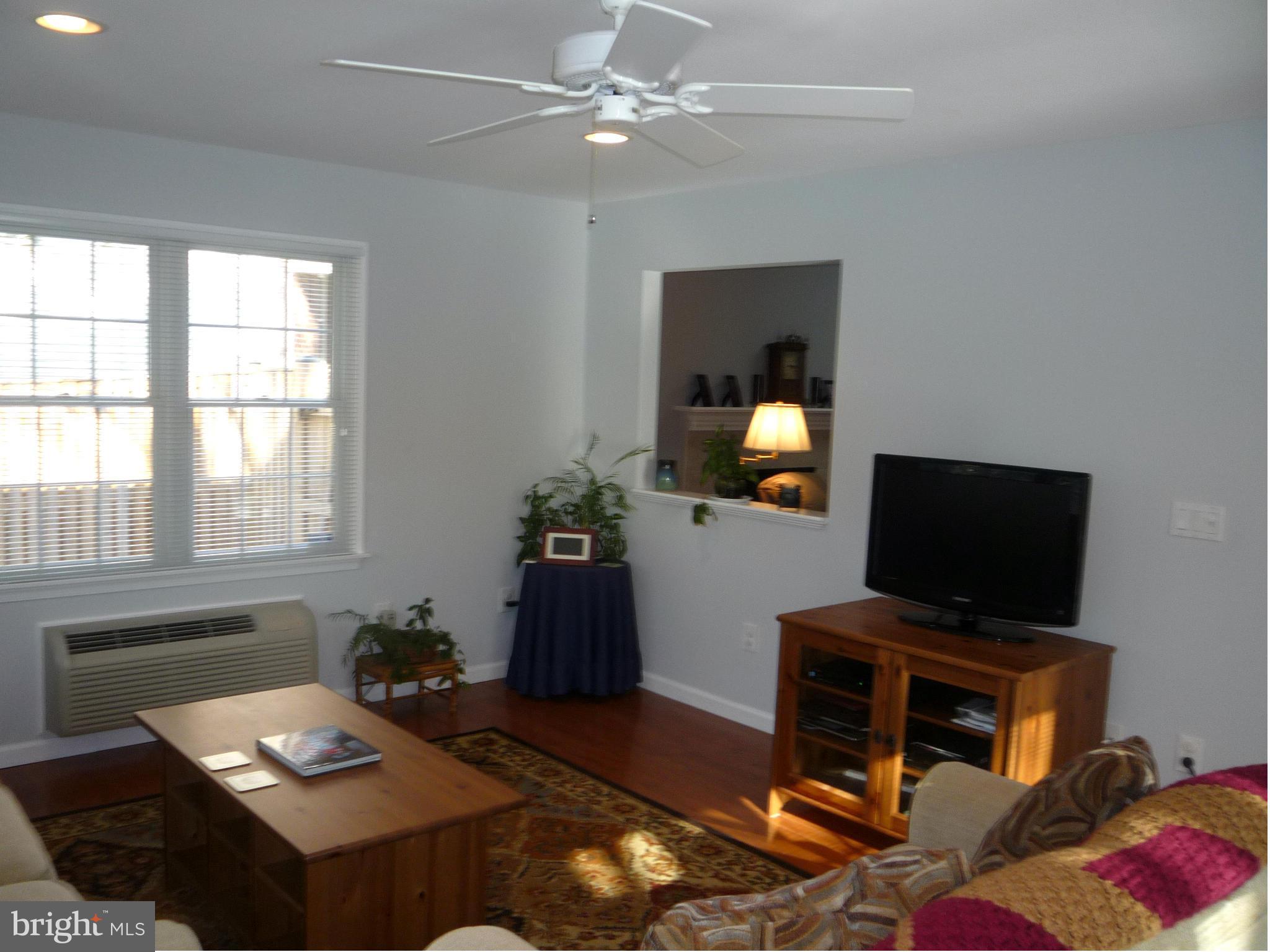 250 Lindenhall Court Riva, MD 21140 - Photo 3 of 29 a living room with furniture and a flat screen tv
