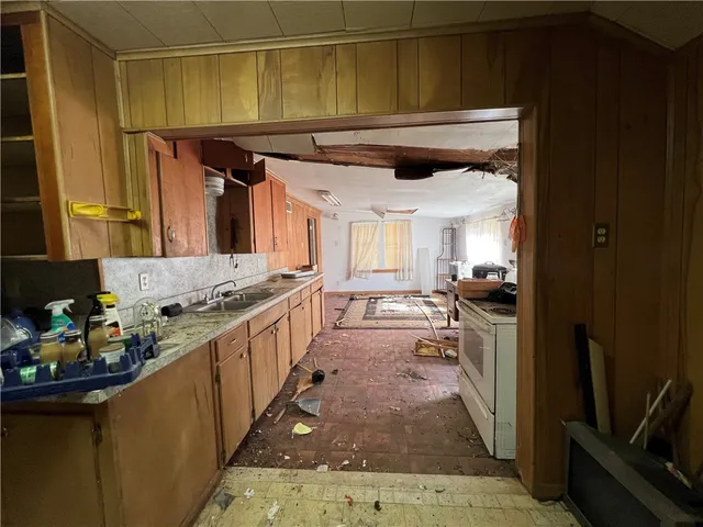 a living room with a couch and a stove