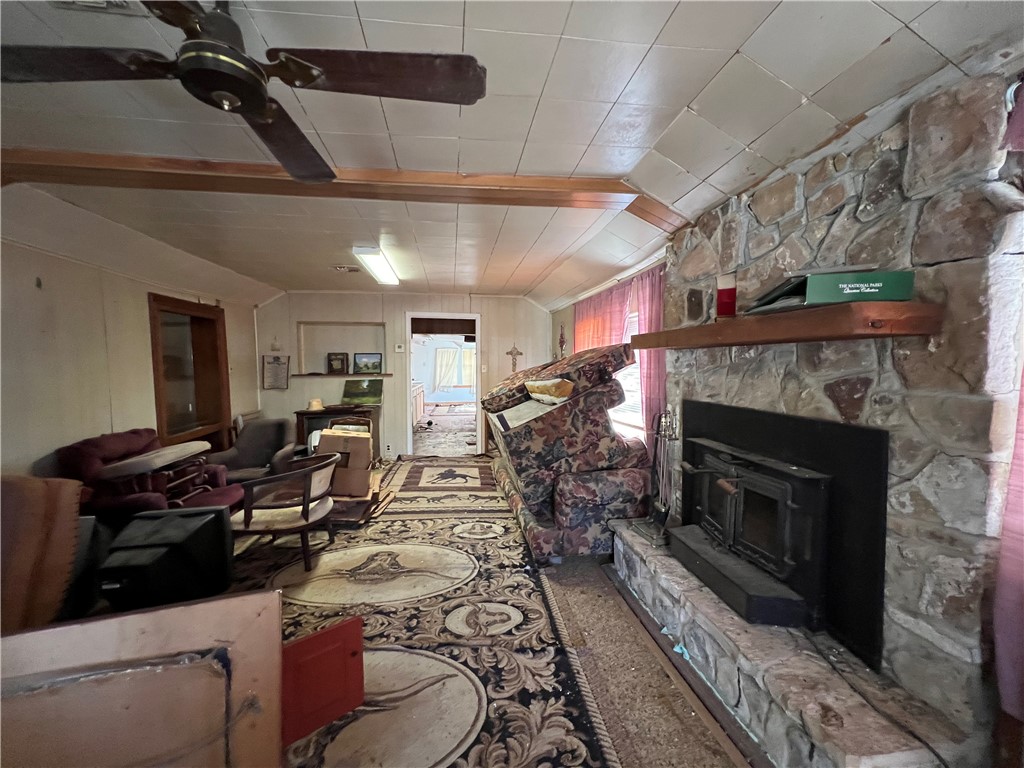 113 4th Street Mathis, TX 78368 - Photo 6 of 26 a living room with furniture and a fireplace