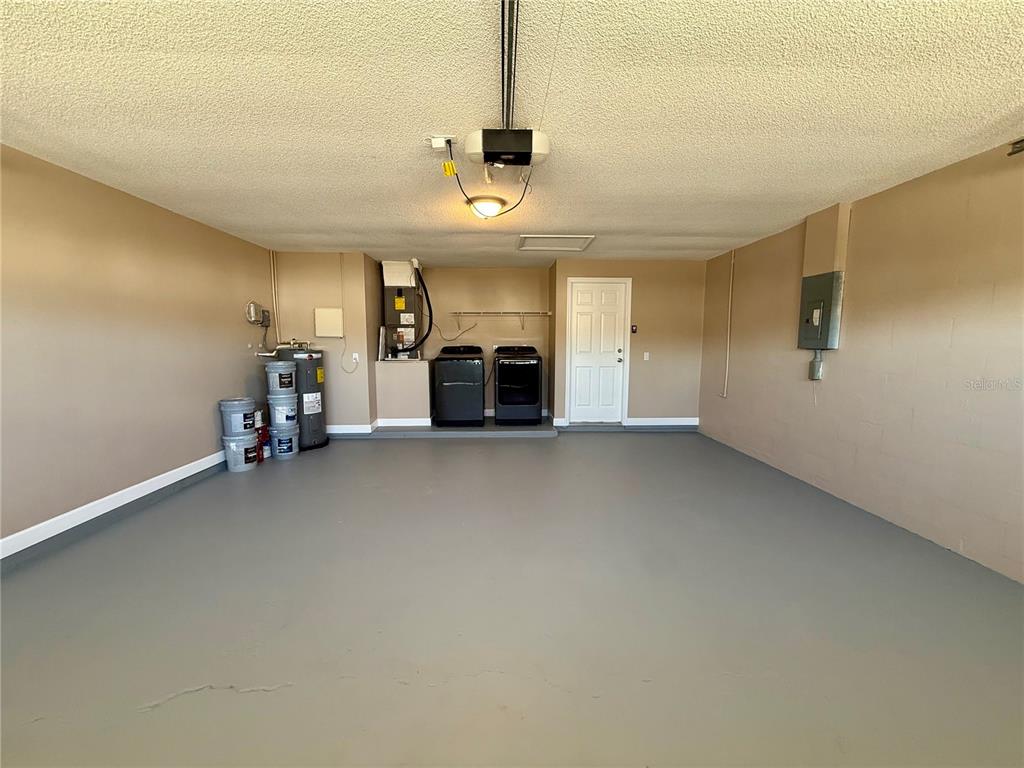 3541 65th Ave Circle East Sarasota, FL 34243 - Photo 14 of 17 an empty room with furniture and a fireplace