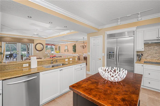 a view of a dining room with furniture and window