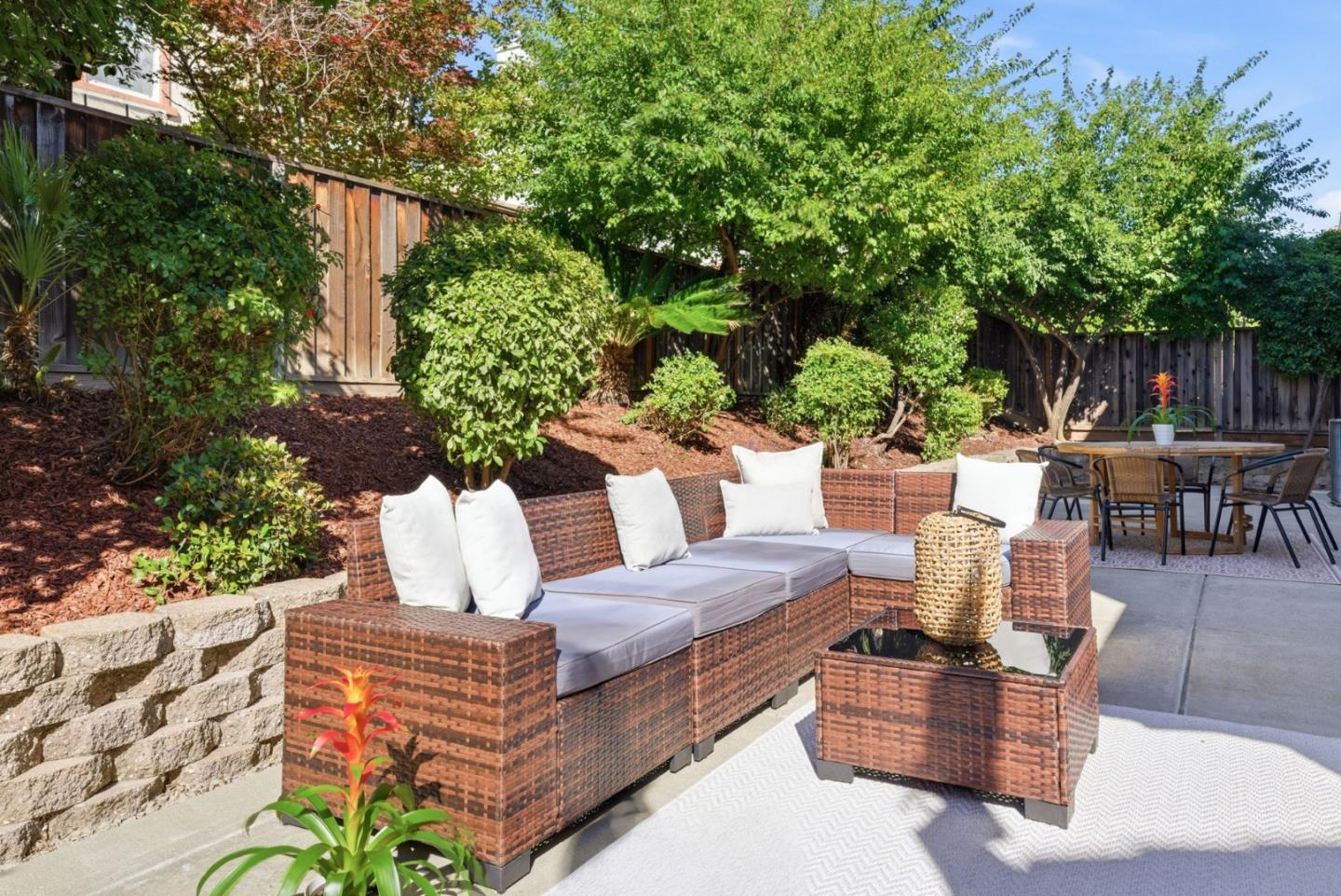 2556 Harlow Lane San Ramon, CA 94582 - Photo 47 of 62 a view of a patio with couches table and chairs and potted plants