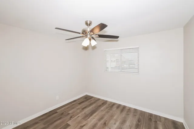 a kitchen with a sink stove and refrigerator
