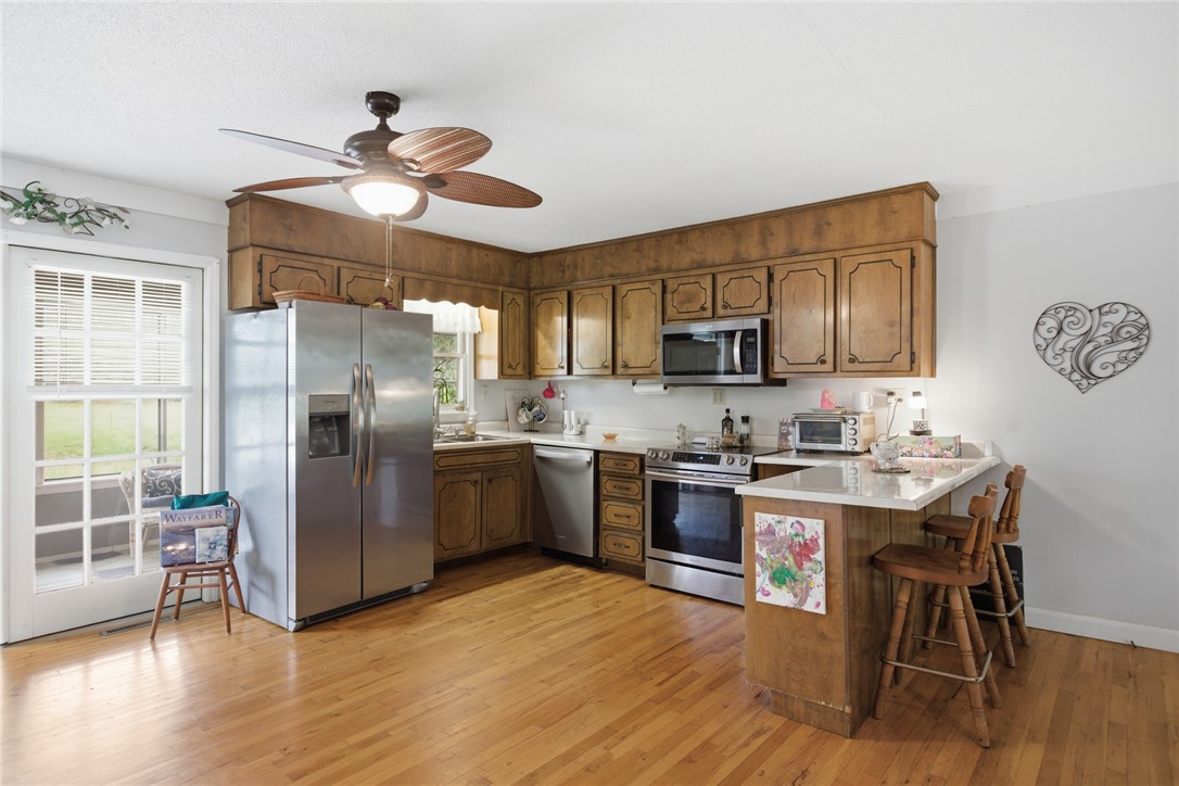 2001 Highway 59 Westminster, SC 29693 - Photo 11 of 38 This bright kitchen features stainless steel appliances and ample counter space for daily living.
