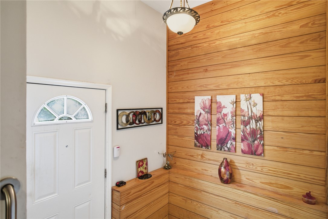 2001 Highway 59 Westminster, SC 29693 - Photo 21 of 38 This inviting entryway features natural wood paneling and elegant overhead lighting.