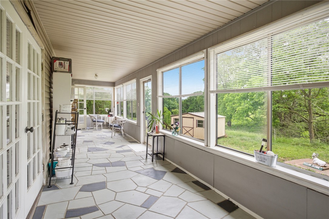 2001 Highway 59 Westminster, SC 29693 - Photo 33 of 38 This bright sunroom offers expansive views, creating a serene and inviting space.