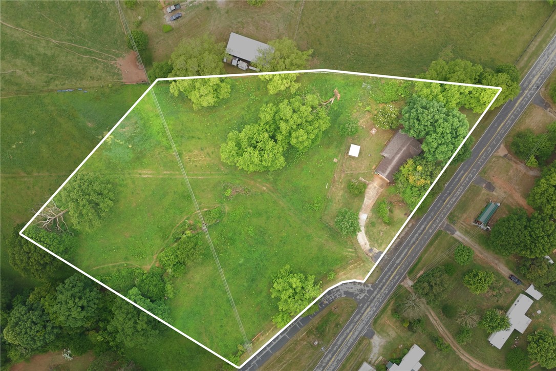 2001 Highway 59 Westminster, SC 29693 - Photo 35 of 38 Expansive green acreage with mature trees offers a private and serene setting.