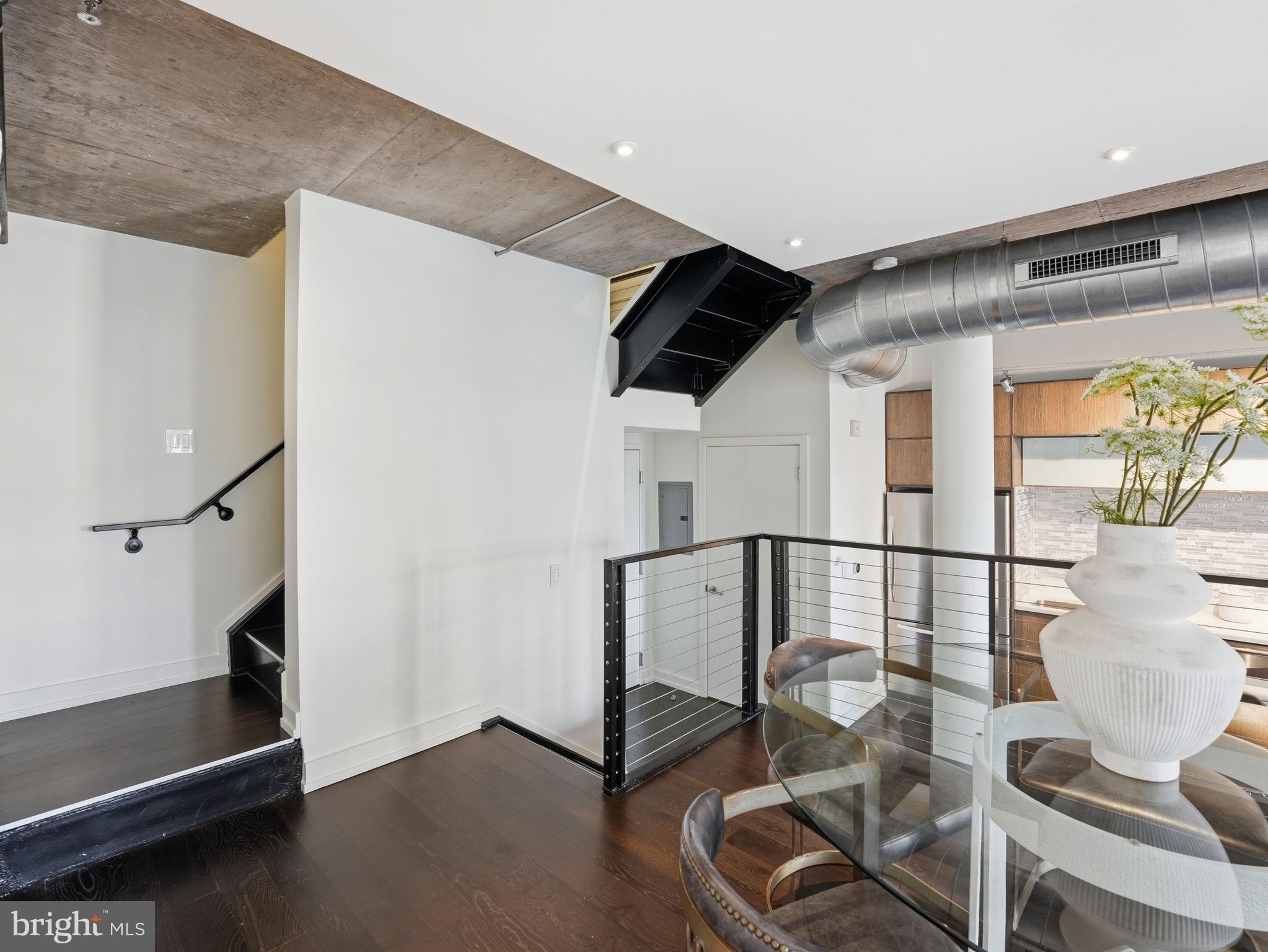1515 15th Street Northwest, Unit 401 Washington, DC 20005 - Photo 15 of 37 Stairs leading to second floor, two bedroom suites