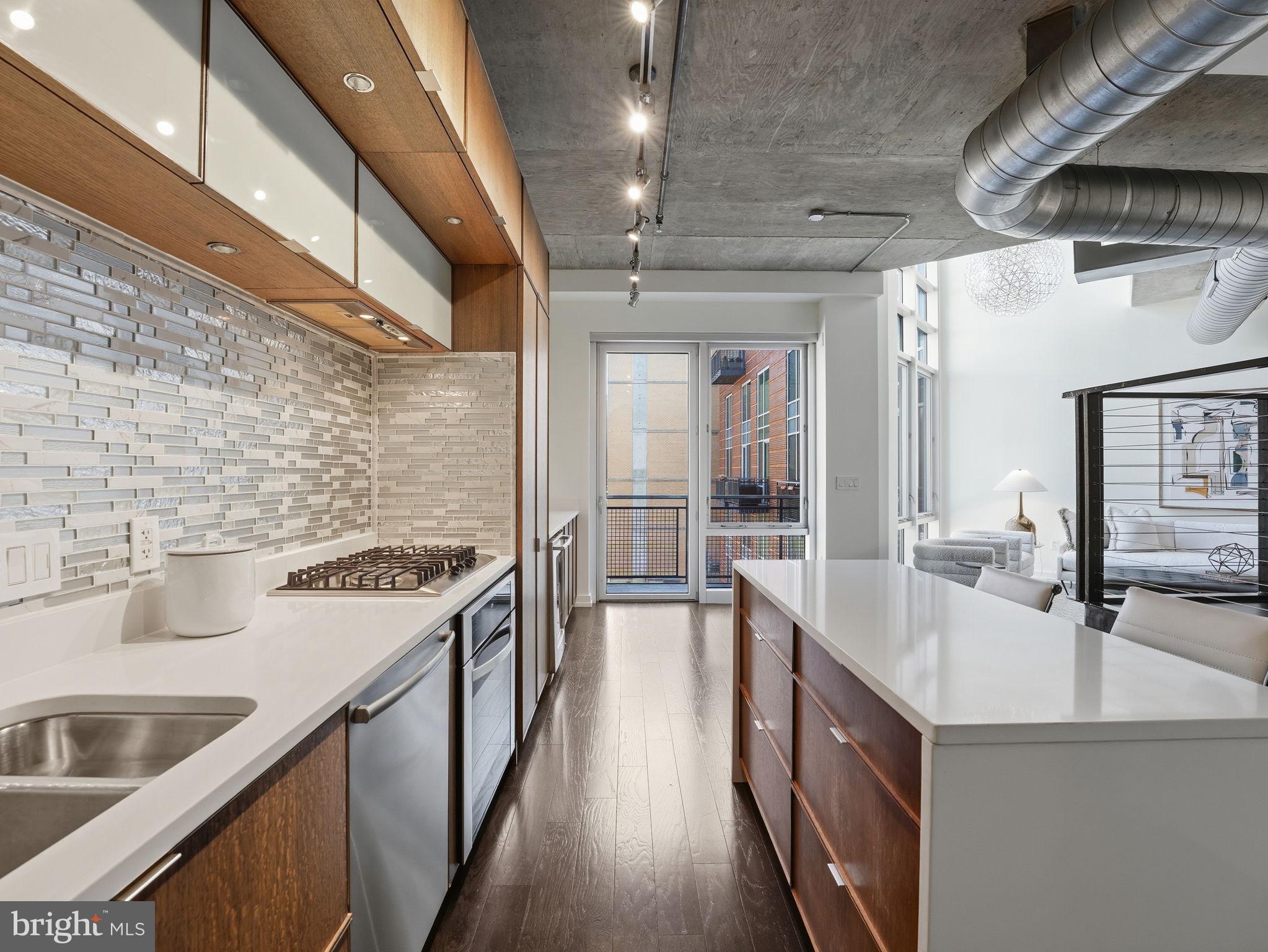 1515 15th Street Northwest, Unit 401 Washington, DC 20005 - Photo 9 of 37 Gourmet Kitchen with Custom Cabinetry