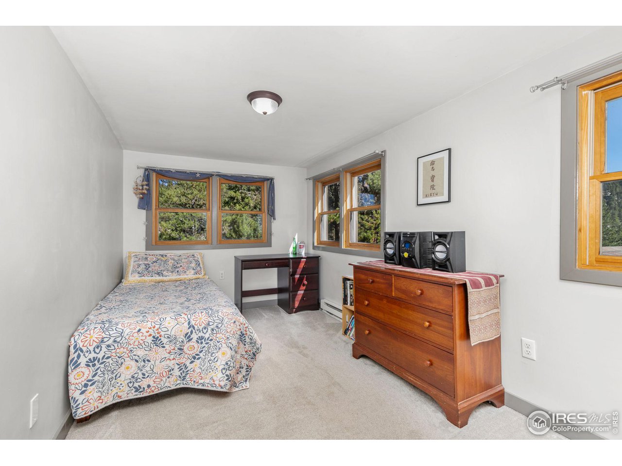 3072 Highway 72 Black Hawk, CO 80422 - Photo 18 of 36 a bedroom with furniture and a window