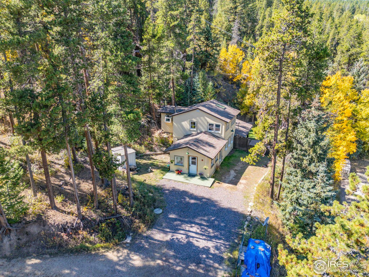 3072 Highway 72 Black Hawk, CO 80422 - Photo 2 of 36 an aerial view of a house with a yard basket ball court and outdoor seating