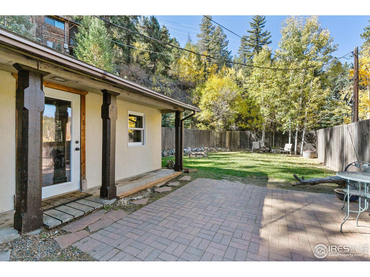 3072 Highway 72 Black Hawk, CO 80422 - Photo 24 of 36 a view of a house with backyard and trees