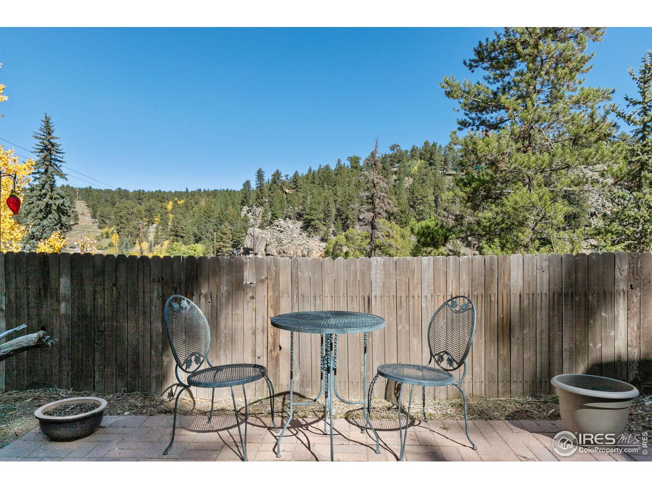 3072 Highway 72 Black Hawk, CO 80422 - Photo 25 of 36 a view of a chairs and table in a patio