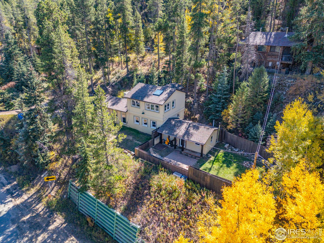 3072 Highway 72 Black Hawk, CO 80422 - Photo 32 of 36 an aerial view of a house with a yard basket ball court and outdoor seating