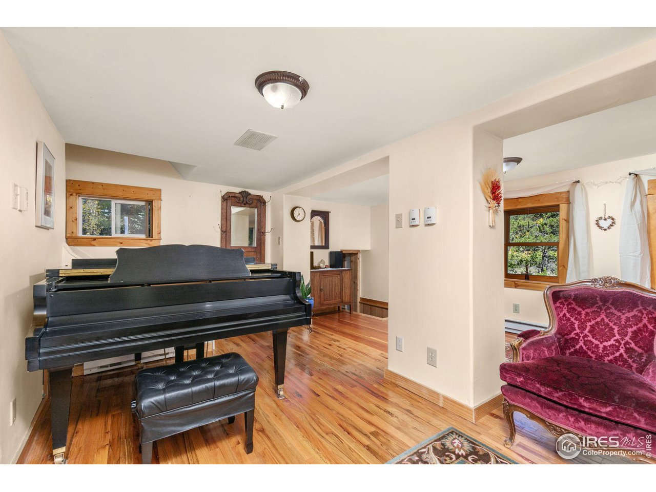 3072 Highway 72 Black Hawk, CO 80422 - Photo 9 of 36 a living room with furniture and a wooden floor