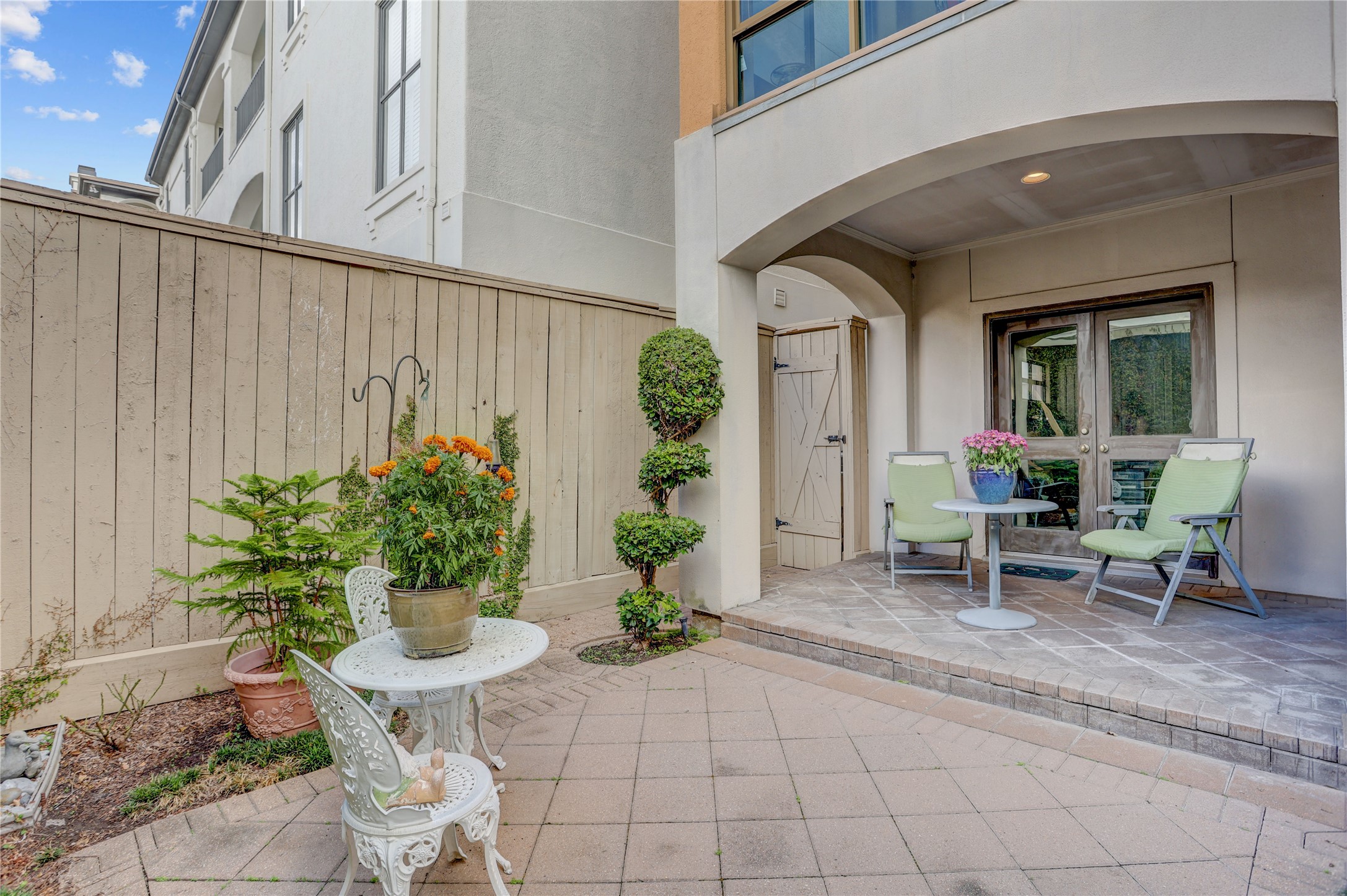 1008 Potomac Drive Houston, TX 77057 - Photo 13 of 34 a view of a chair and table in backyard of the house
