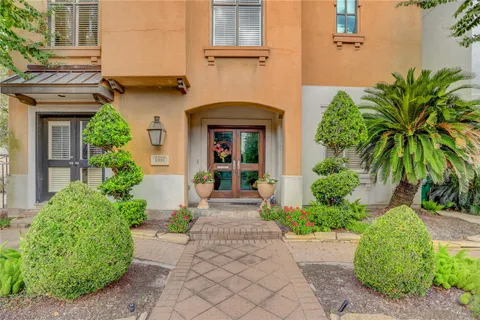 front view of a house with a small yard