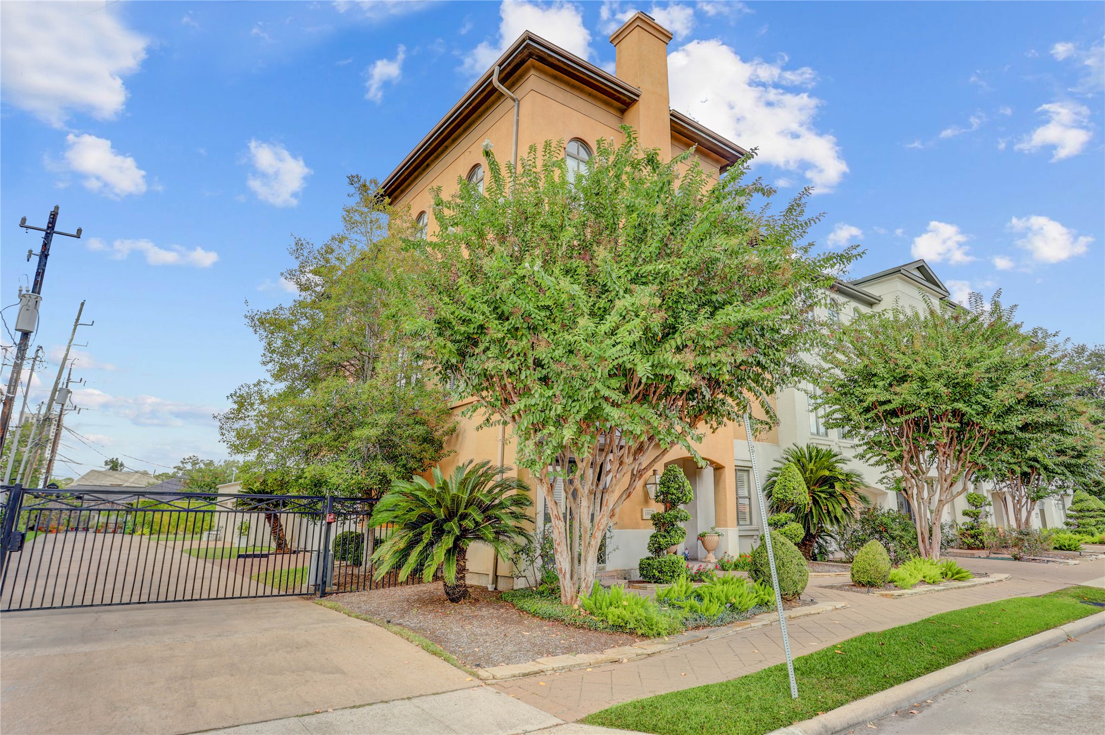 1008 Potomac Drive Houston, TX 77057 - Photo 7 of 34 a view of a large building with large trees and plants