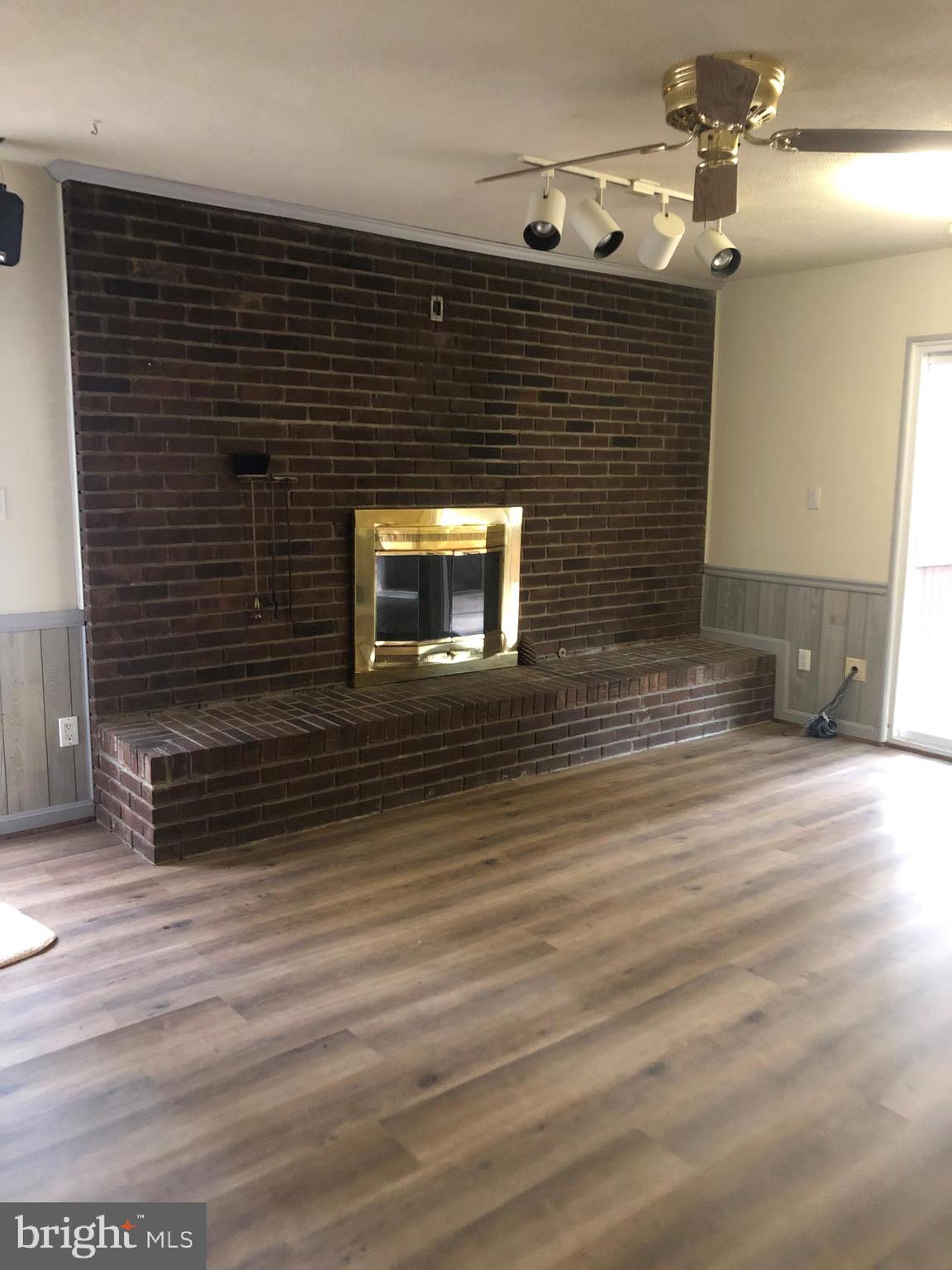 8533 Old Stillhouse Road Rixeyville, VA 22737 - Photo 10 of 36 Brick fireplace