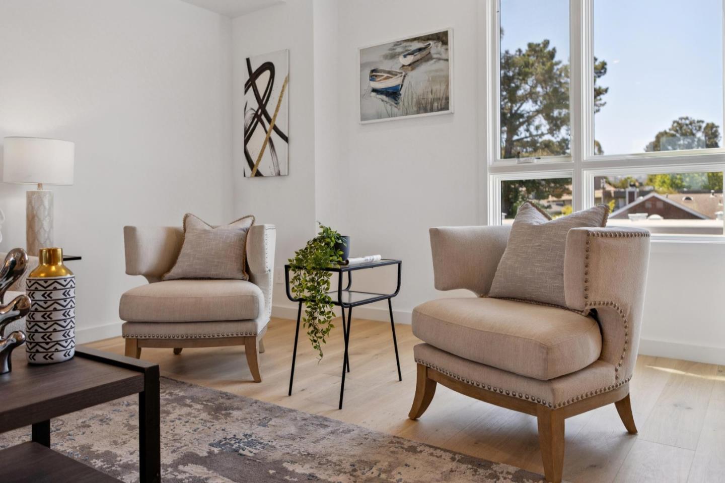 1433 Floribunda Avenue, Unit 5 Burlingame, CA 94010 - Photo 18 of 58 a living room with furniture and wooden floor