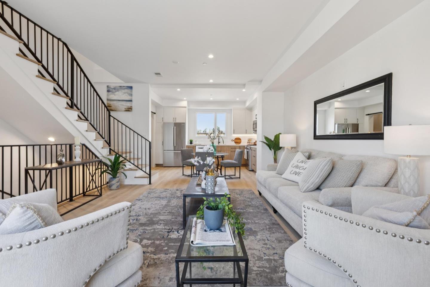 1433 Floribunda Avenue, Unit 5 Burlingame, CA 94010 - Photo 19 of 58 a living room with furniture and wooden floor