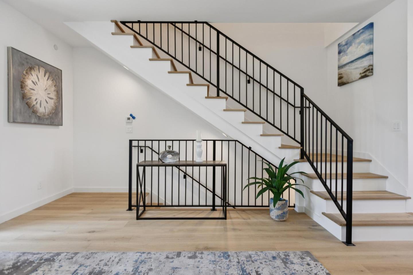 1433 Floribunda Avenue, Unit 5 Burlingame, CA 94010 - Photo 20 of 58 a view of entryway with wooden floor