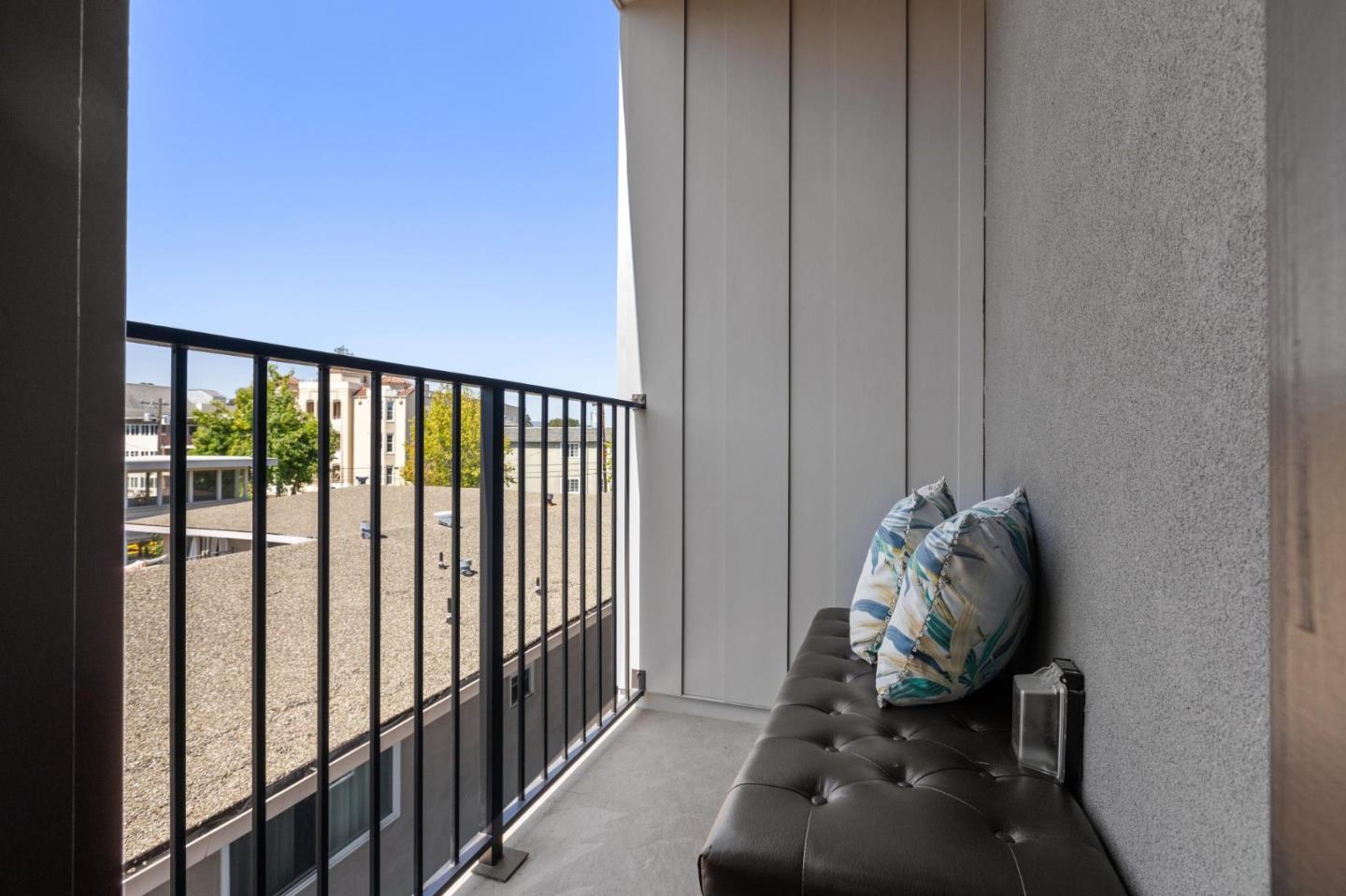 1433 Floribunda Avenue, Unit 5 Burlingame, CA 94010 - Photo 31 of 58 a view of a porch with furniture and a gate