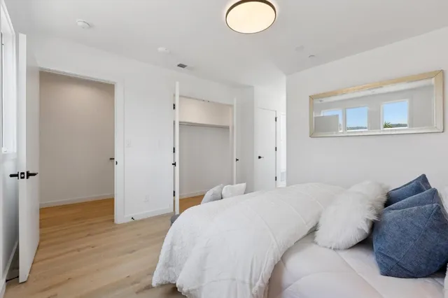 a bathroom with a shower sink and mirror