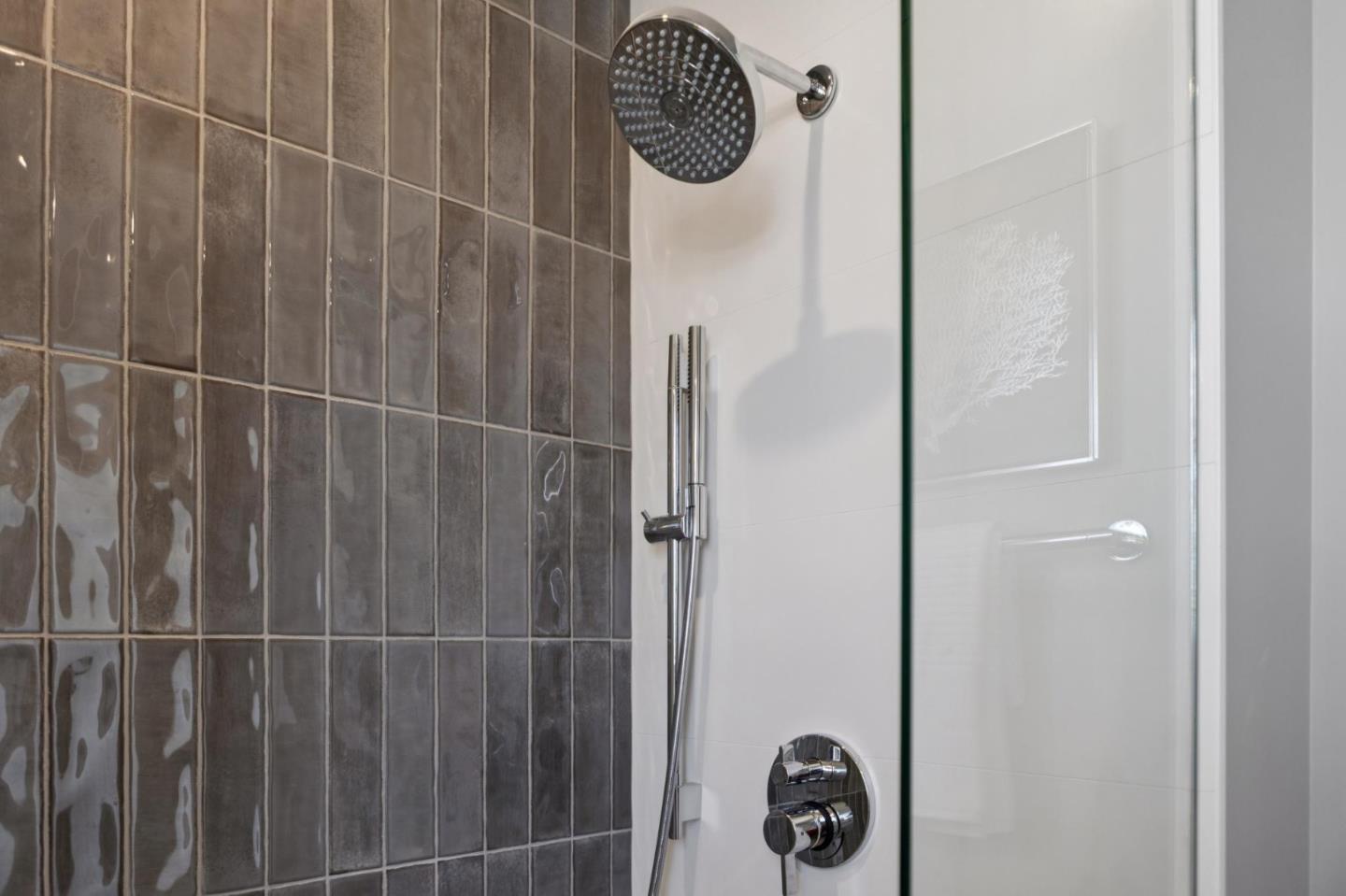 1433 Floribunda Avenue, Unit 5 Burlingame, CA 94010 - Photo 39 of 58 a bathroom with a shower