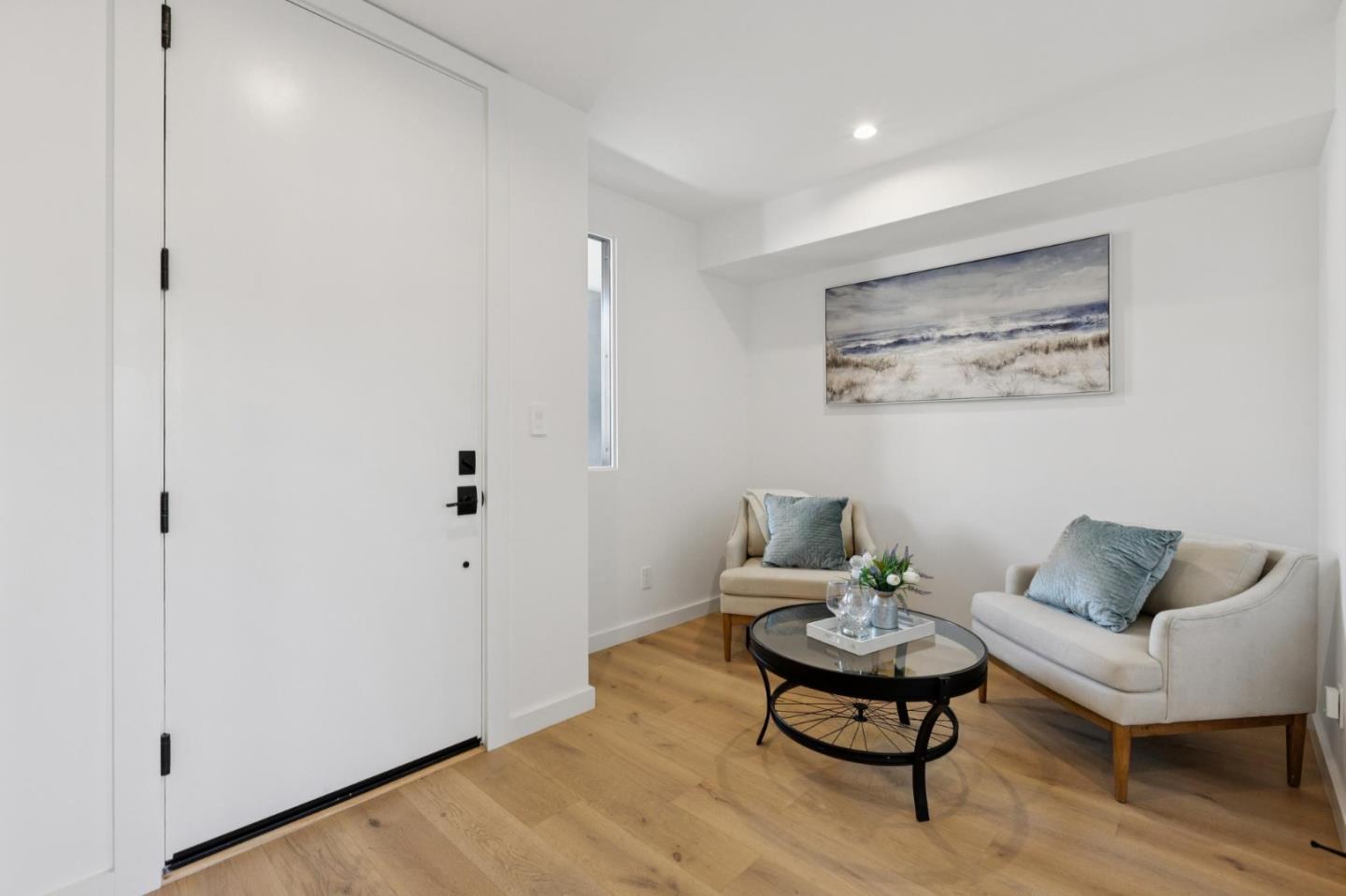 1433 Floribunda Avenue, Unit 5 Burlingame, CA 94010 - Photo 4 of 58 a living room with furniture