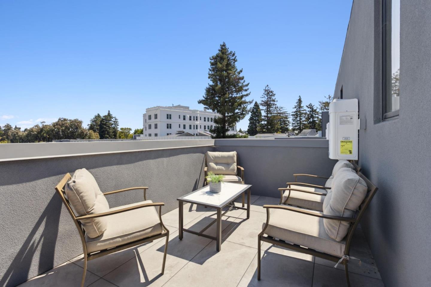 1433 Floribunda Avenue, Unit 5 Burlingame, CA 94010 - Photo 41 of 58 a view of chair and tables