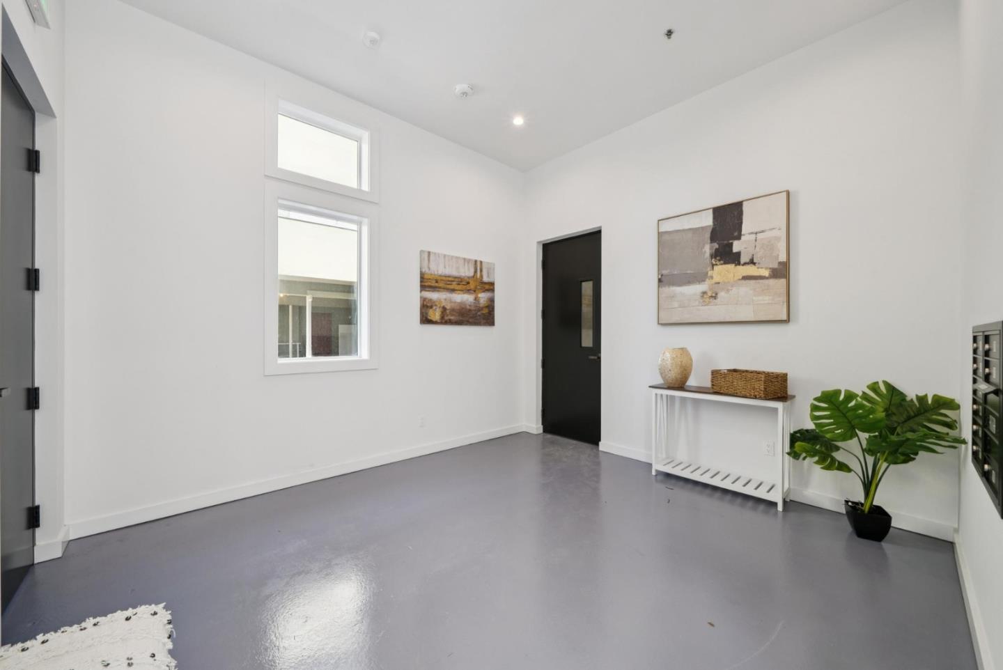 1433 Floribunda Avenue, Unit 5 Burlingame, CA 94010 - Photo 48 of 58 a view of livingroom with furniture and a potted plant
