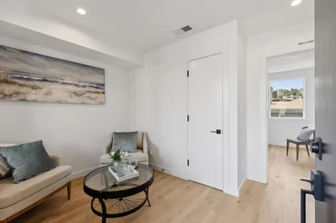 a bedroom with bed and a window