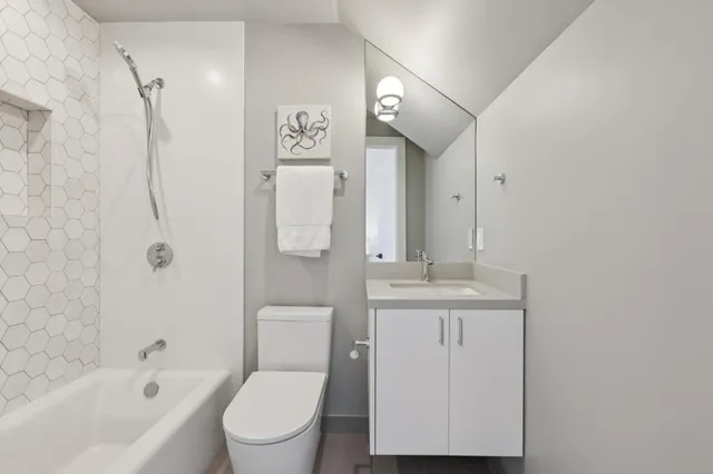 a close up of a bathtub curtain