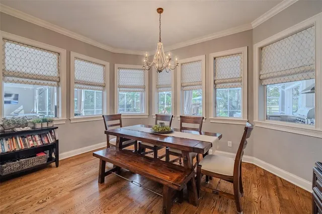 a living room with furniture fireplace and flat screen tv