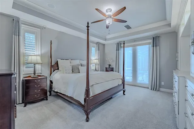 a view of a livingroom with furniture and staircase