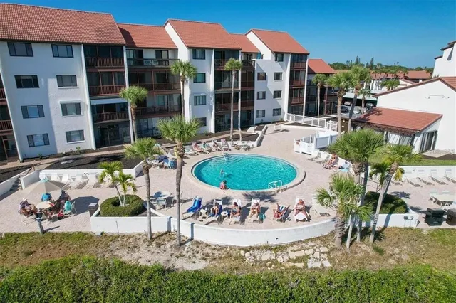 an outdoor view of a house with garden