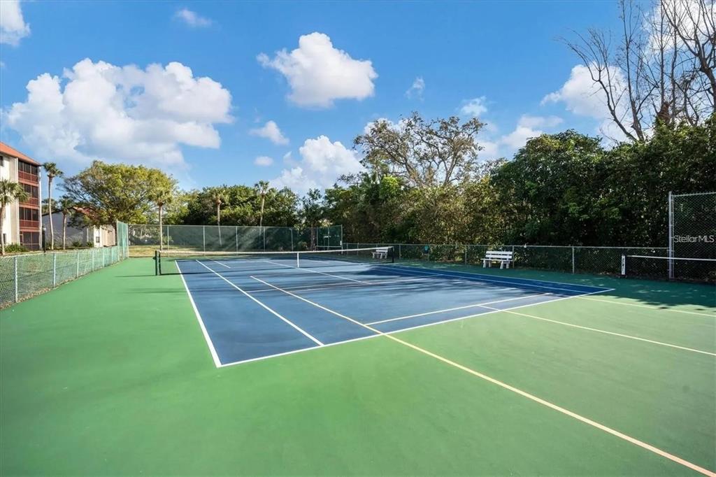 1624 Stickney Point Road, Unit 108 Sarasota, FL 34231 - Photo 20 of 39 a view of a tennis court