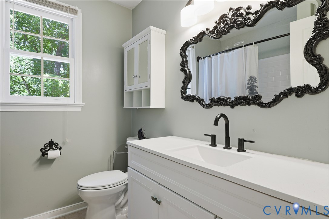 12512 2nd Branch Road Chesterfield, VA 23838 - Photo 37 of 56 a bathroom with a sink toilet and a mirror