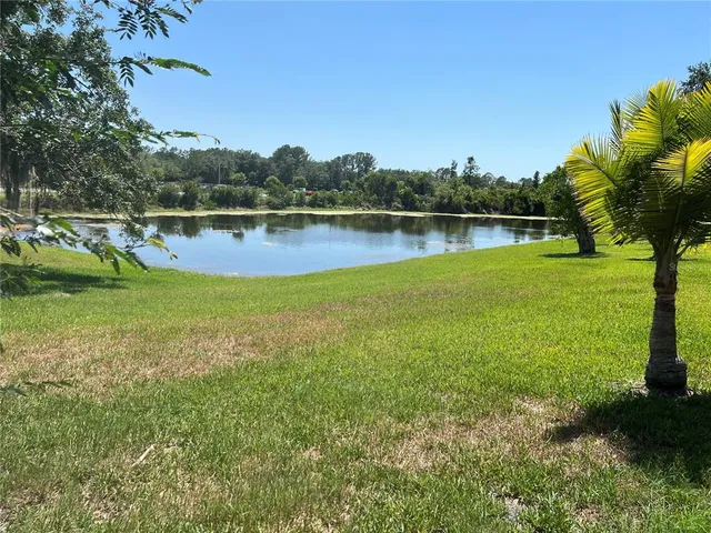 a view of a lake with a park