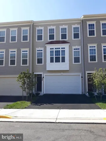 a front view of a house having yard