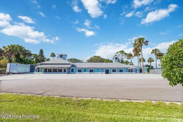 a bathroom with a sink toilet and a mirror