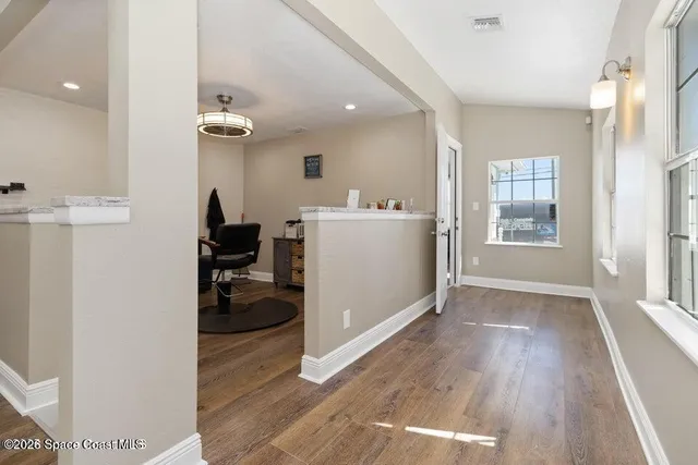 an aerial view of a house with outdoor space