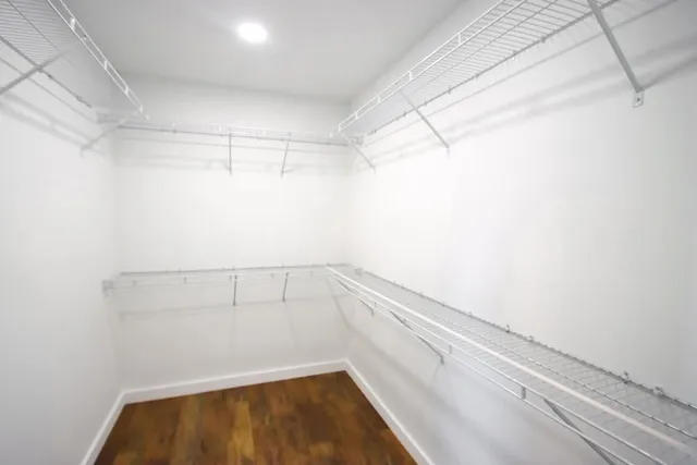 a view of a room with racks on the wall