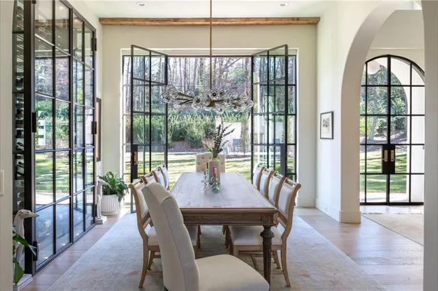 a view of a dining room with furniture window and outside view